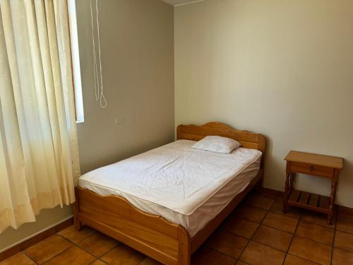 Ένα ή περισσότερα κρεβάτια σε δωμάτιο στο Casa en Mollendo