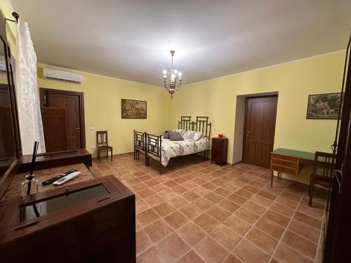 Una cama o camas en una habitación de Dimora Nobile