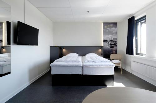 Ένα ή περισσότερα κρεβάτια σε δωμάτιο στο Four Points Flex by Sheraton Ishoj