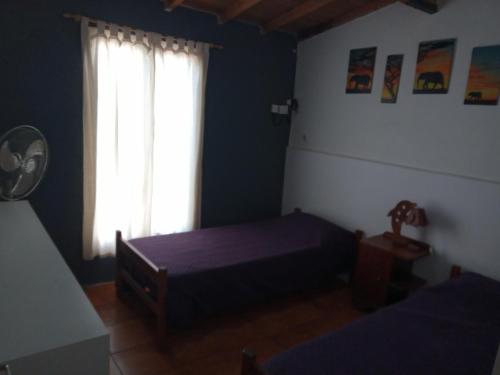 Llit o llits en una habitació de Lo de Marito