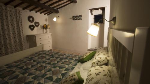 Кровать или кровати в номере Case di Civita