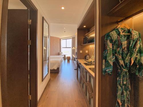 Η κουζίνα ή μικρή κουζίνα στο 1BR direct seaview - 5 mins to the beach - infinity pool - Apec Mui Ne