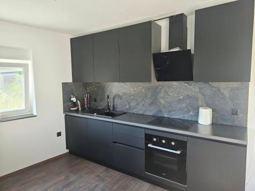 Köök või kööginurk majutusasutuses Family friendly house with a swimming pool Solin, Split - 21376