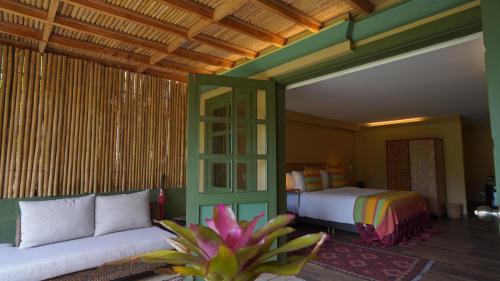 Postel nebo postele na pokoji v ubytování Sazagua Cocora Reserva Natural