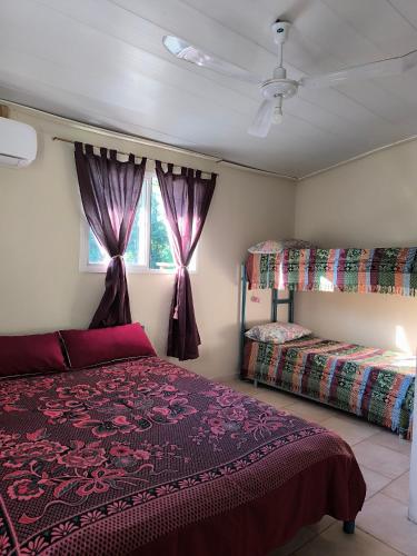 Ένα ή περισσότερα κρεβάτια σε δωμάτιο στο El Maná