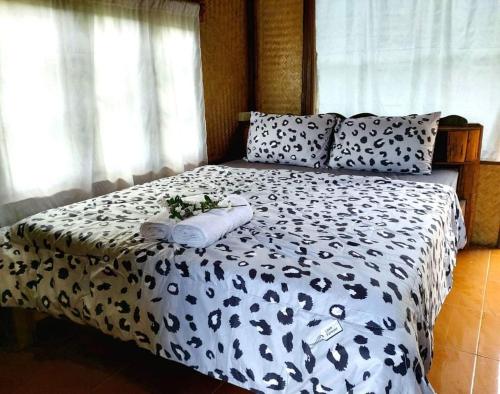 Postel nebo postele na pokoji v ubytování DoiLom Farmstay