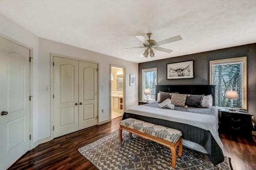 a bedroom with a bed and a ceiling fan at Poconos Paradise Lakeskihikewater Parkkids in Lake Harmony