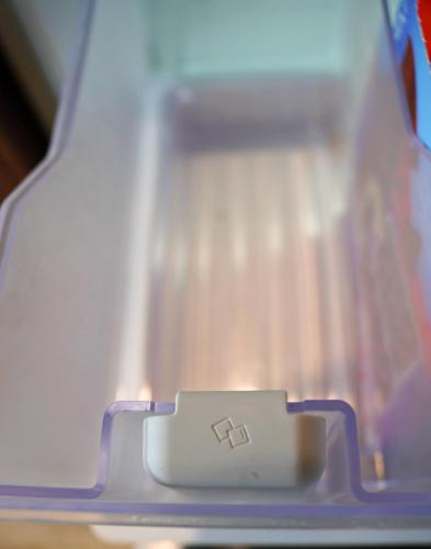 a plastic box with a white object in it at Elite Escape Hawera in Hawera