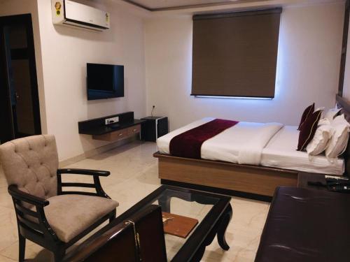 TV a/nebo společenská místnost v ubytování Hotel Gharana Tree