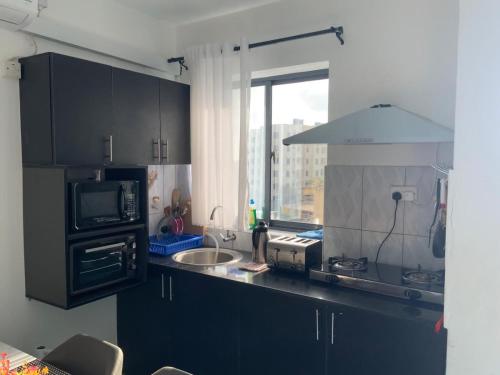 Køkken eller tekøkken på Mombasa Apartments