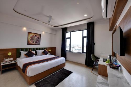 Rúm í herbergi á Soil to Soul Trinity Hotel - A Boutique Stay