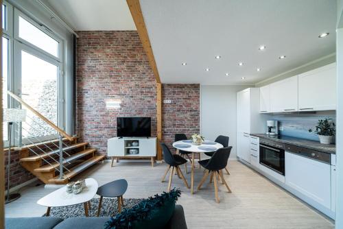 Η κουζίνα ή μικρή κουζίνα στο Ferienanlage Serams - Stilvolle Studio- Apartments nahe Binz