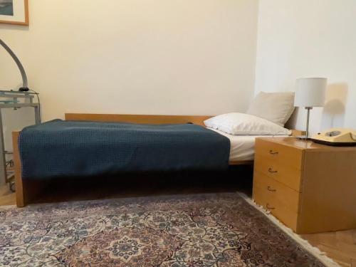 Postel nebo postele na pokoji v ubytování Hotel Wiener Kindl