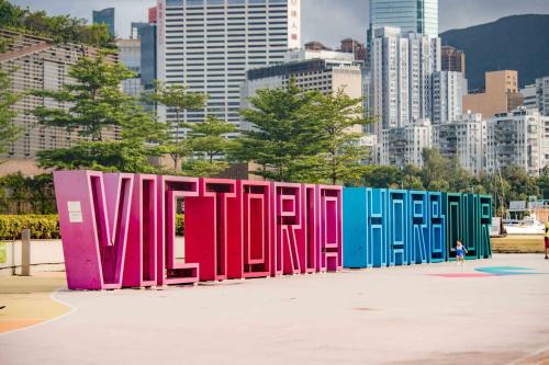 a row of colorful dividers in front of a city at ibis Hong Kong North Point in Hong Kong