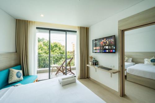 Кровать или кровати в номере HAYA Sea View Hotel Phu Quoc