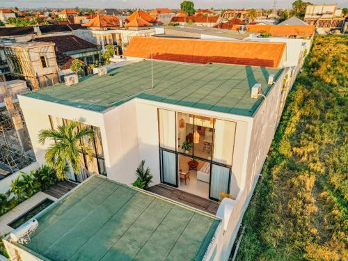 an overhead view of a house with an orange roof at 2BR Ricefield View Villa in Munggu Easy Beach Access in Munggu