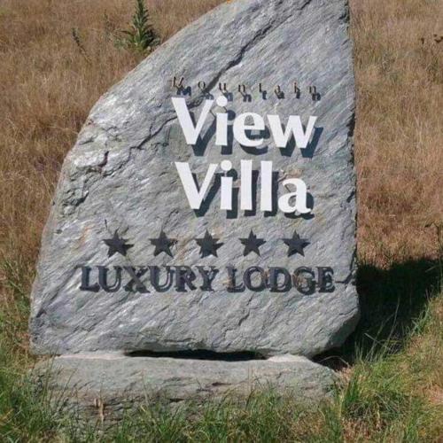 a rock with the words new villa on it at Chagall Suite in an 6-bedroom luxury villa in Blenheim