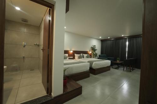 Postel nebo postele na pokoji v ubytování Georjoys Hotels & Resorts