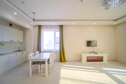 TV a/nebo společenská místnost v ubytování Eagle Town Serviced Apartment