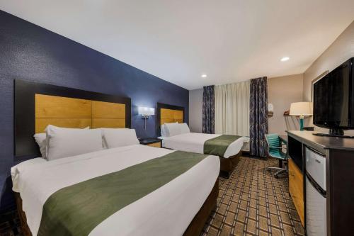 Letto o letti in una camera di Quality Inn - Denton