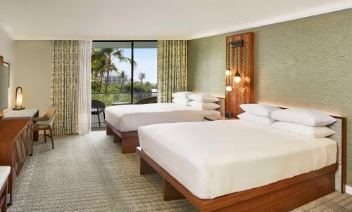 Ein Bett oder Betten in einem Zimmer der Unterkunft Hyatt Regency Maui Resort & Spa