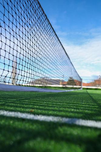 a soccer net on a field of grass at Sheki Palace Hotel in Sheki