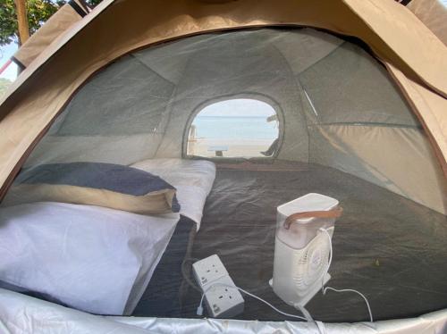 Кровать или кровати в номере Cabana Campsite