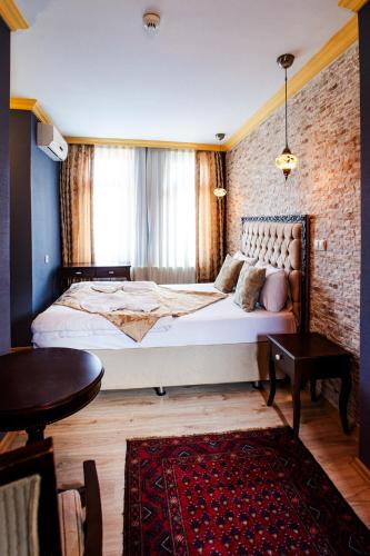 Cama o camas de una habitación en Cheers Hostel