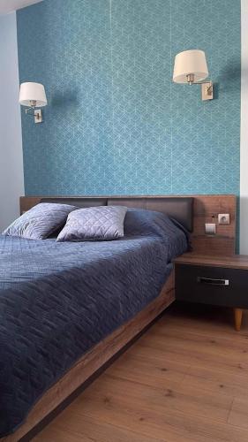 Postel nebo postele na pokoji v ubytování La Cour des Grands