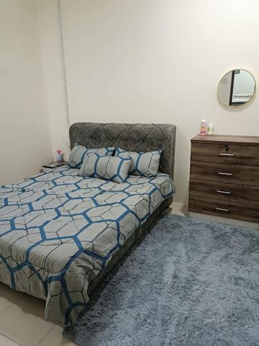Postel nebo postele na pokoji v ubytování Amirah homestay