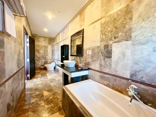 Koupelna v ubytování Champa Resort & Spa