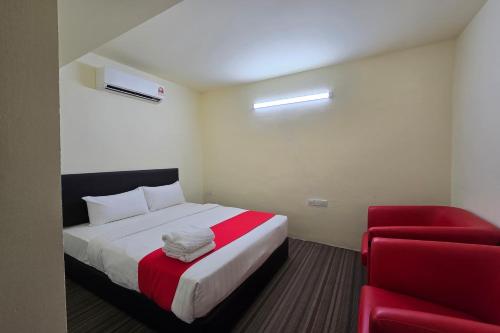 Ένα ή περισσότερα κρεβάτια σε δωμάτιο στο Hotel Seri Warisan Melaka, Stadium Hang Tuah
