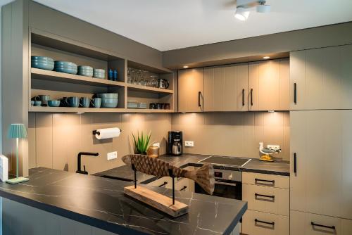 Una cocina o cocineta en Taun Hövt