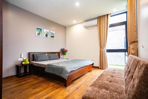 Katil atau katil-katil dalam bilik di Happy Villa Hồ Cầu Bãi