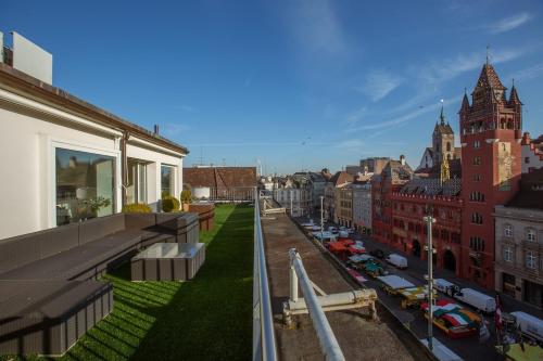 a view of a city from the balcony of a building at The Penthouse Basel in Basel