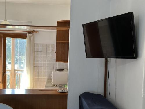 TV a/nebo společenská místnost v ubytování il corallaro