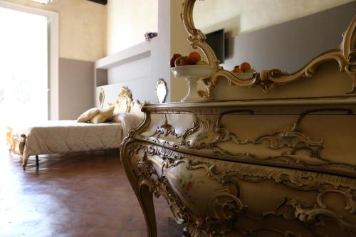 Katil atau katil-katil dalam bilik di B&B Suite Palazzo Luciani