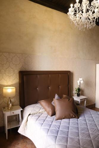 Katil atau katil-katil dalam bilik di B&B Suite Palazzo Luciani