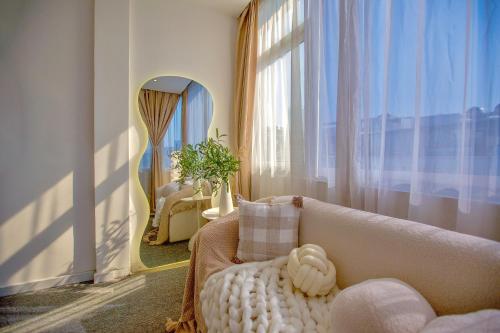 Posezení v ubytování Keypad Hotel - 28 Dịch Vọng Hậu