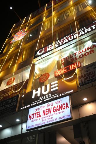 a building with signs on the side of it at Hotel New Ganga in Guwahati