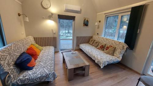 Posezení v ubytování Small 24 sq m house for 6 people with 2 extra beds