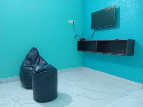 Televisyen dan/atau pusat hiburan di The Triple Nest