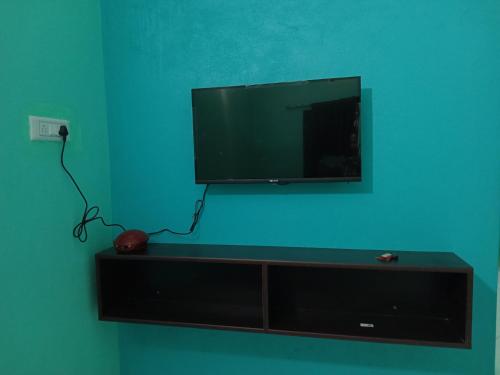 Televisyen dan/atau pusat hiburan di The Triple Nest
