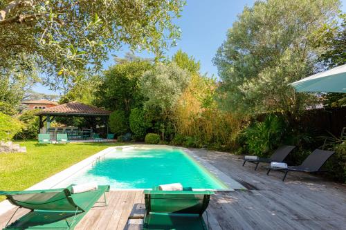 Photo de la galerie de l'établissement LA ROSERAIE - Family home with swimming pool, à Biarritz