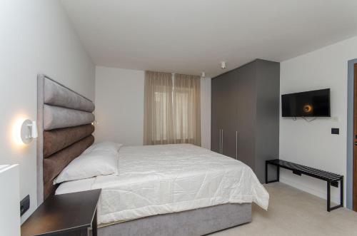 Katil atau katil-katil dalam bilik di Azure Heaven Apartment w heated pool