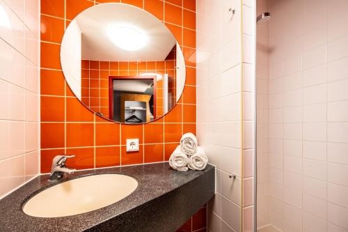 Koupelna v ubytování Hotel Rhynern Nord