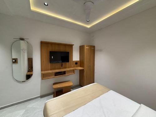TV a/nebo společenská místnost v ubytování Hotel Pulse Town