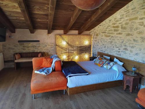 Postel nebo postele na pokoji v ubytování Xana Casa Rural