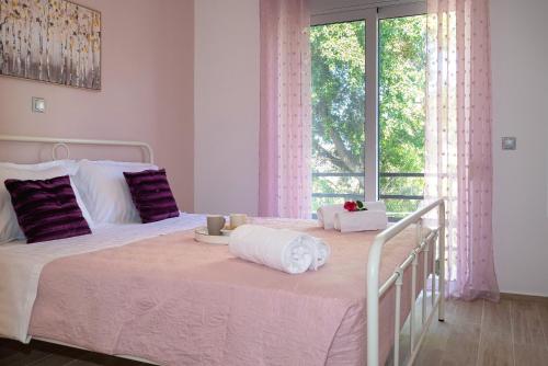 Voodi või voodid majutusasutuse Filerimos City Center Apt in Ialysos Rhodes toas