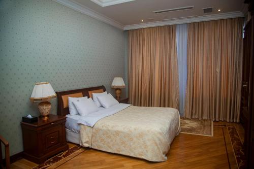 Cama o camas de una habitación en AYF Palace